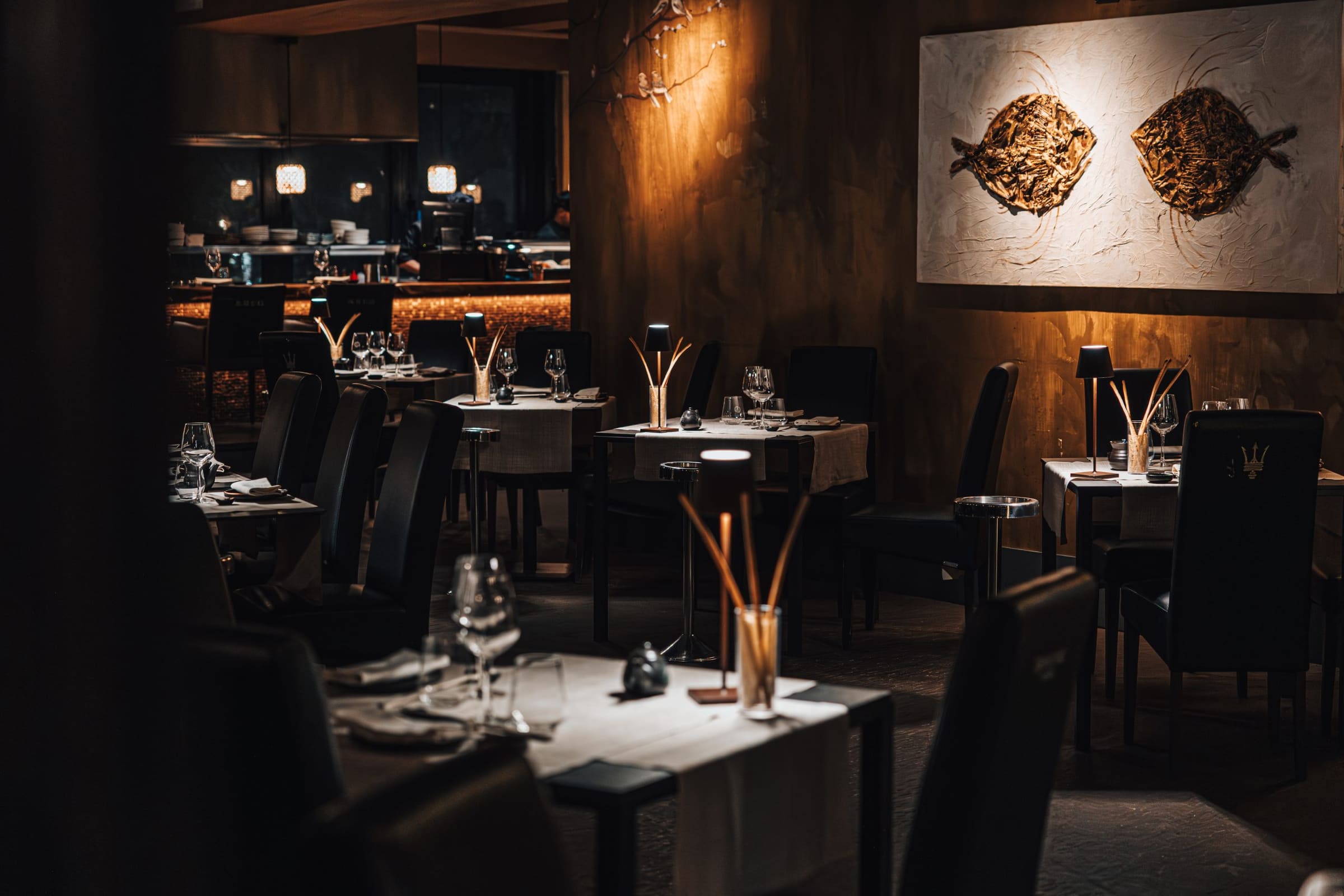 Elegant dining room of a Japanese restaurant in Milan with set tables
