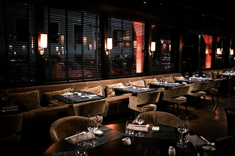 Elegant restaurant interior with set tables.